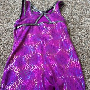 Purple gymnastics leotard with built in shorts